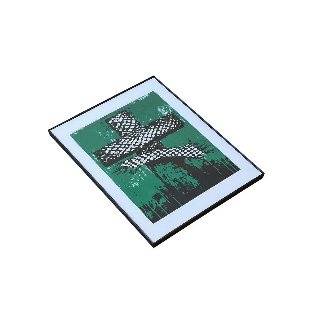 Framed poster side view with green cross wrapped in a keffiyeh — cultural artwork from Arabcore.
